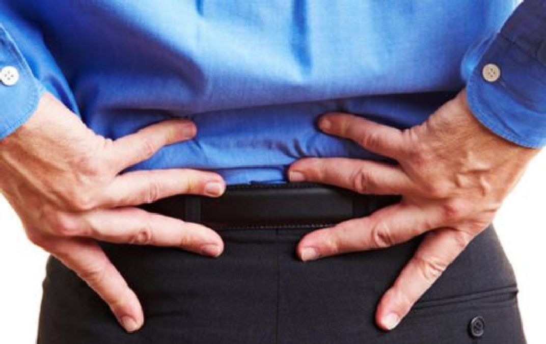 Douleurs du bas du dos et de l’estomac: Les causes possibles