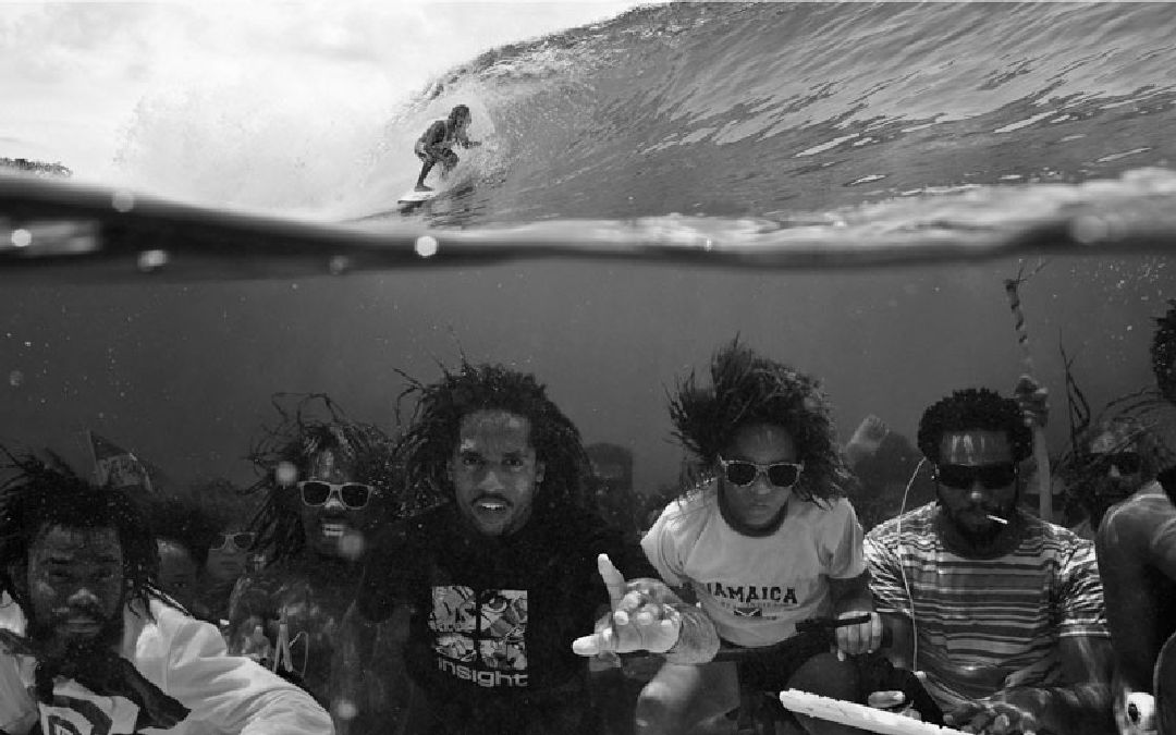 underwater group photo surfing above perfect timing
